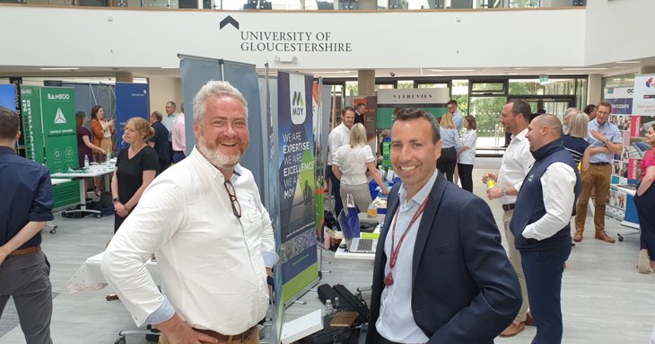 Jonathan White of Constructing Excellence Gloucestershire at the annual conference at the University of Gloucestershire's business school with Andy Bates of Gloucester College