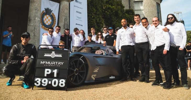 The team from Gloucestershire engineering firm McMurtry Automotive celebrate their car setting the fastest ever time for the 1.6 mile hill climb at the Goodwood Festival of Speed - covering the course