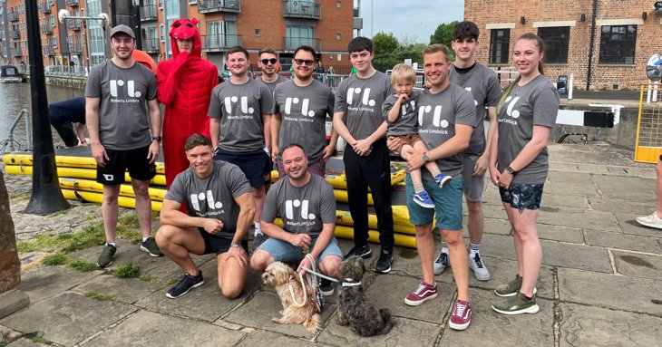 The team from Gloucestershire architects and growth business Roberts Limbrick line up ahead of the Rotary Club of Gloucester's Dragon Boat Festival 2022 at the city's Docks.