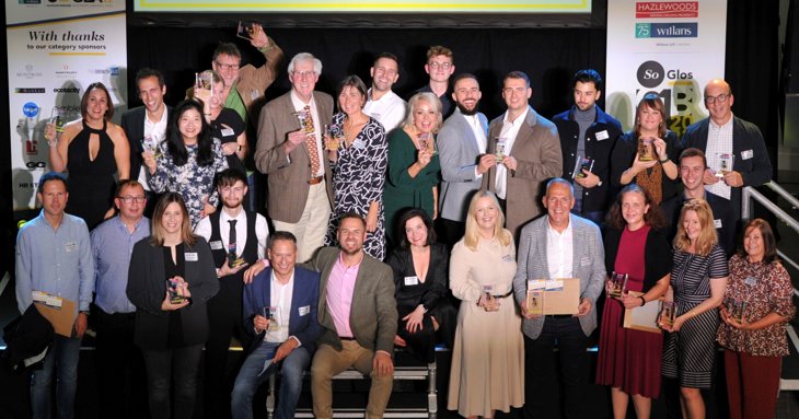 Winners of SGGBA 2022 gather on stage to take the applause at the University of Gloucestershire Business School.