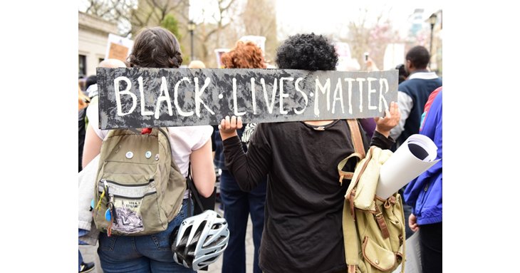 Almost 4,000 miles from Minneapolis, a peaceful Black Lives Matter protest is being held in Cheltenham.