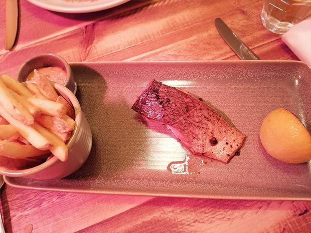 The grilled salmon fillet paired perfectly with the tomato hollandaise.