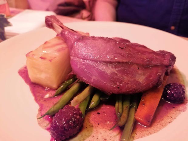 Duck leg confit with blackberries, dauphinoise potato and port and red wine sauce.