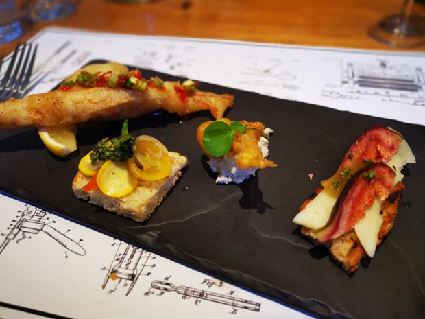Garden heritage tomato crostini; pecorino and garden fig crostini; tempura of prawn and squid with sweet chilli sauce; spiced cauliflower wings with butterbean hummus.