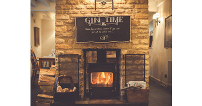 The fireplace at The Maytime Inn, Asthall Manor, Asthall, Burford
