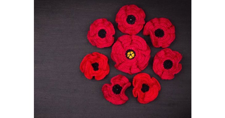 More than 200 crocheted poppies have been displayed to commemorate fallen students