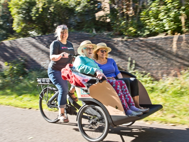 Lilian Faithfull Care residents in Cheltenham are being taken out on the new trishaw bike, thanks to Signal employees.