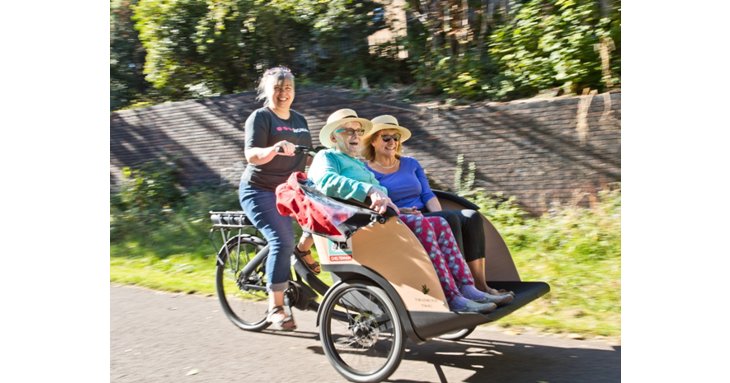 Lilian Faithfull Care residents in Cheltenham are being taken out on the new trishaw bike, thanks to Signal employees.
