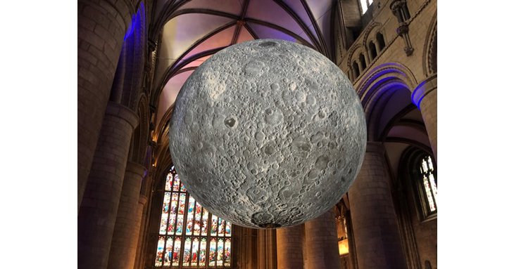 Luke Jerram's Museum of the Moon is in the Nave of Gloucester Cathedral.