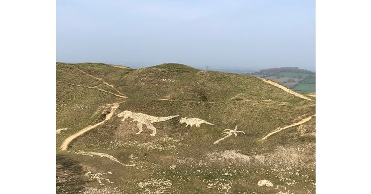 A velociraptor, triceratops and even a giant tyrannosaurus rex have all been created by one family at Selsley Quarry in Stroud during lockdown.