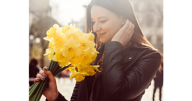 Staff at Gloucester Quays are surprising customers with free bunches of daffodils this March 2022.