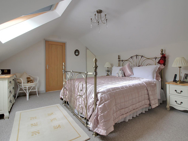 The master bedroom has its own ensuite bathroom and a dressing room, while the other two double bedrooms share a family bathroom with jacuzzi bath.