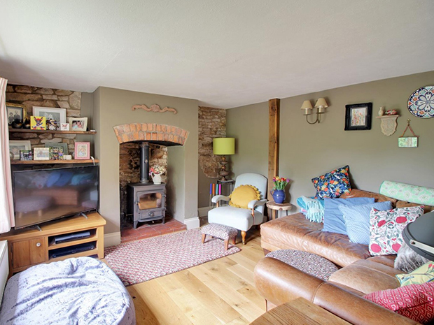 The property has two reception rooms, both with beautiful feature fireplaces.