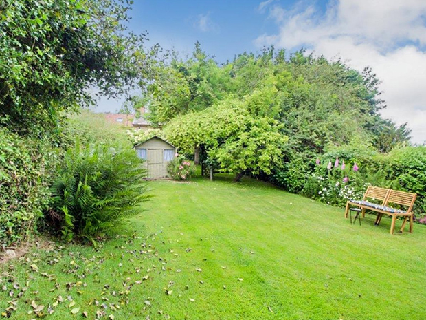 There is a large rear garden offering plenty of space for children to play, as well as additional land perfect for growing-your-own veg.