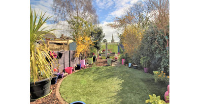 The outside space boasts a tidy lawn ideal for little ones, a patio and pergola for alfresco entertaining, as well as a workshop and parking for two cars.
