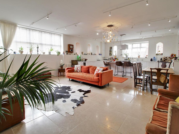 The contemporary kitchen living room is a large and flexible space with a clean finish.