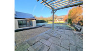 As well as a large garden, the property has an outbuilding which doubles up as a workshop and studio.