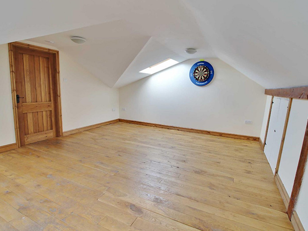 There is also a double garage with a first-floor games room and planning permission for ancillary accommodation.