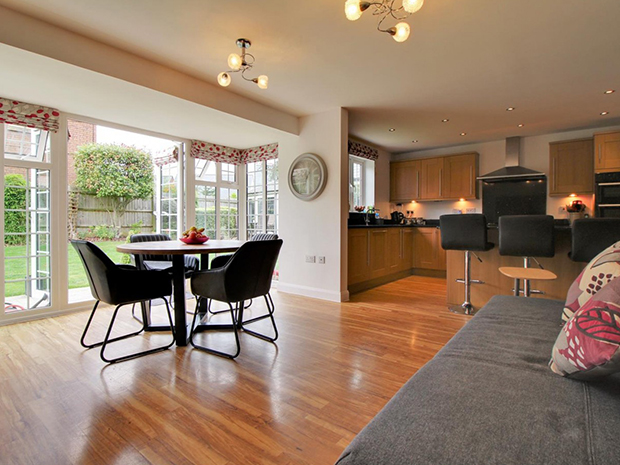The highlight of the property is its enviable kitchen dining space with integrated appliances  including a double oven and a dishwasher  and French doors out into the garden.
