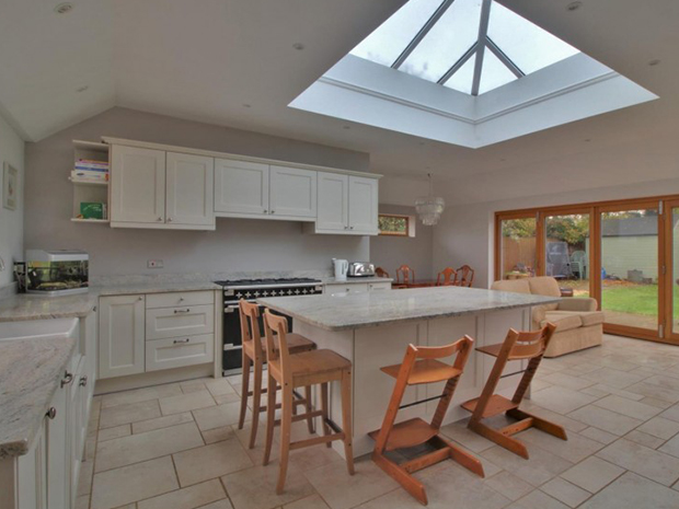 The expansive kitchen has a beautiful skylight lantern positioned over the main kitchen island.
