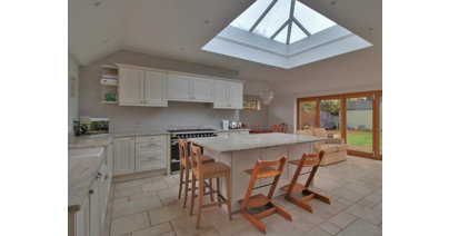 The expansive kitchen has a beautiful skylight lantern positioned over the main kitchen island.