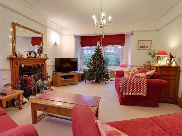 The two reception rooms and dining room all have feature fireplaces.