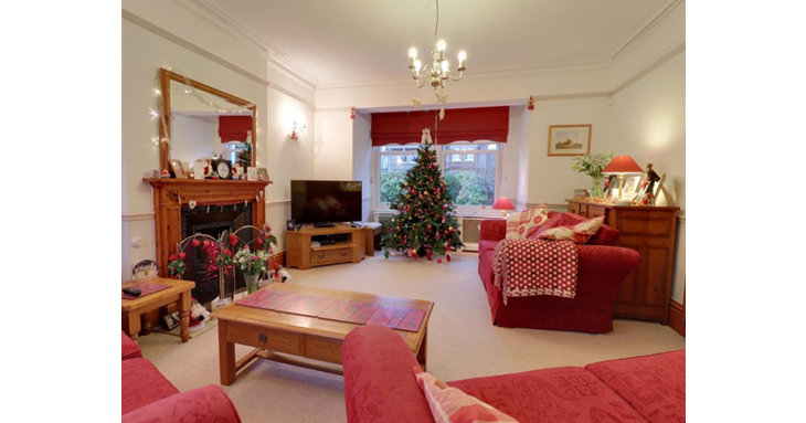 The two reception rooms and dining room all have feature fireplaces.