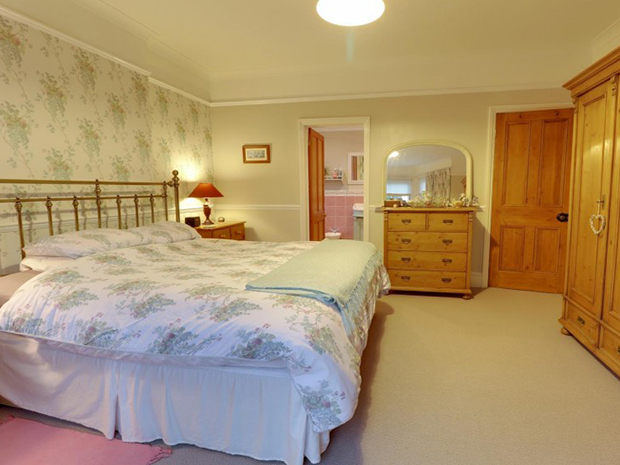 The master bedroom has its own en-suite with a bath tub, with the property also having a family bathroom, shower room and downstairs cloakroom.