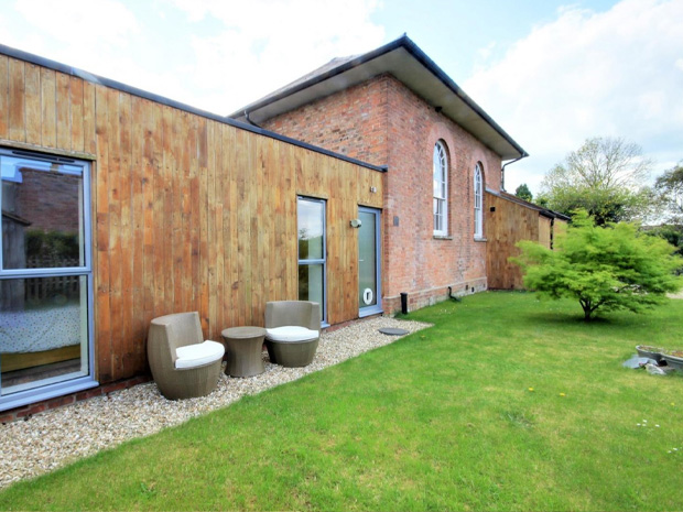 The property also benefits from off-road parking and a tranquil garden to the side of the house.