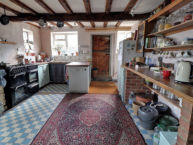 The spacious farmhouse kitchen has an Aga and plenty of room for a family dining table  and theres a separate dining room, drawing room and study too.