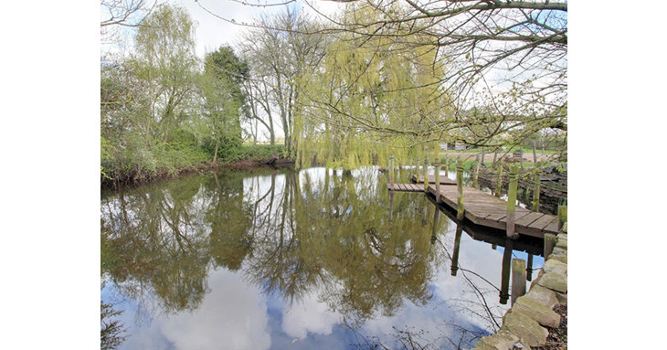 The pond provides an idyllic spot to relax and enjoy the beautiful surroundings, as well as having a jetty to get out onto the water.
