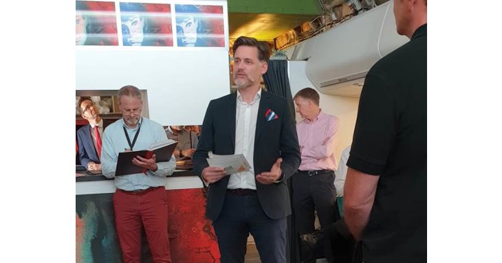 David Owen, chief executive of GFirst LEP, addresses business leaders and partners on board Cotswold Airport's Boeing 747.