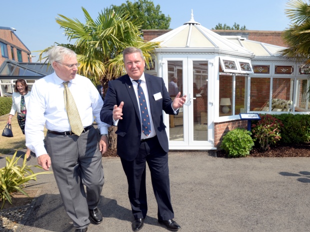 Gary Jones, showing the Duke of Gloucester around Glevum Windows.