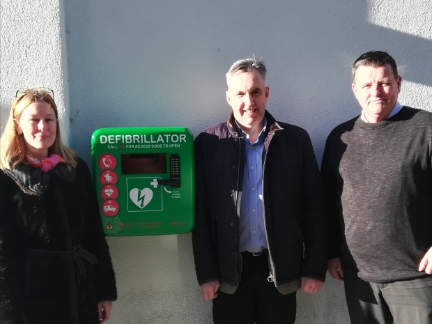 Clare Seed, of Public Hearts Cheltenham Defibrillator Campaign, David Evans, of Evans Jones, and Rob Howse, of The Brewery Quarter, with one of the new public-access defibrillators.