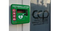 Public Hearts Cheltenham Defibrillator Campaign's new defibrillator outside the offices of Cheltenham charity CCP at 340 High Street.