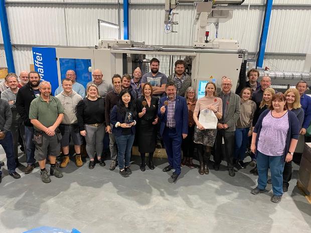 Viv Hargreaves, Deputy Lord Lieutenant for Gloucestershire, and Pete Bungard, Clerk to the Lieutenancy and chief executive of Gloucestershire County Council, with the Queens Award-winning staff from DPS Designs in Coleford.