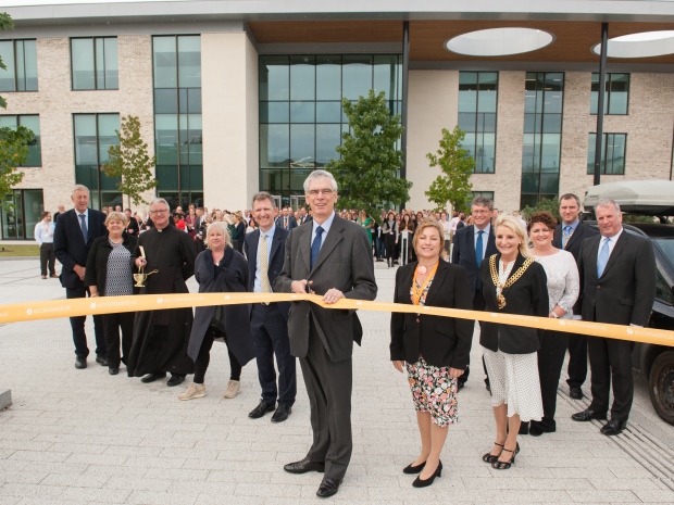 Tim Carroll, chairman of Allchurches Trust, cuts the ribbon to officially open the new Ecclesiastical office building, Benefact House, on Gloucester Business Park. Image by Pixel PR Photography.