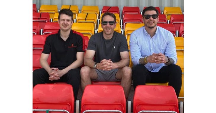 Lee Mills, Alex Petheram and Jay Marriott take a seat in the stands at Meadow Park to announce the birth of Gloucester Sport.
