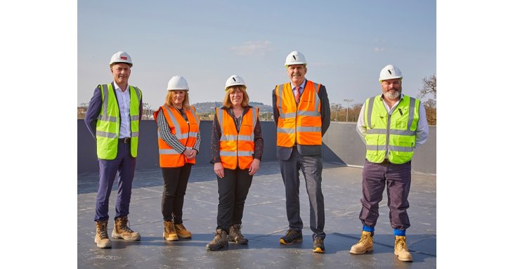 Ben Ramsay, Lesley Worsfold, Lynn Forrester-Walker, Russell Marchant and Mark Price mark the near-completion of the new Graze building.