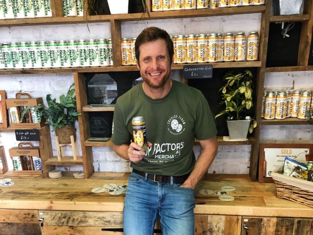 Founder of Gloucester Brewery, Jared Brown, with one of its Perfect 10 beers a six per IPA brewed specially to mark the business's 10th anniversary and the opening of its new taproom.