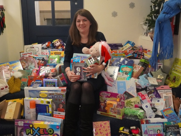 Laura Wilson of King's School with the collection of toys collected for the Mission Christmas charity.
