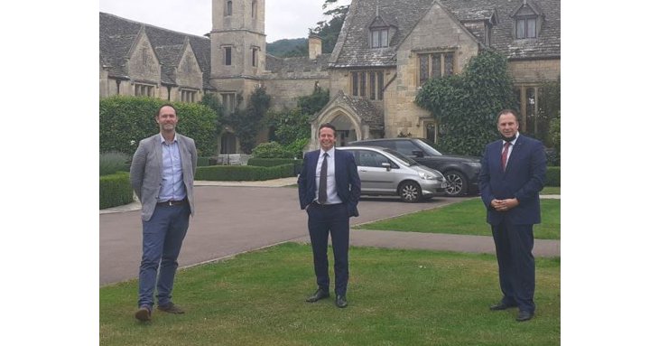 Tourism minister Nigel Huddleston centre, in Gloucestershire to speak to county businesses, on the lawn of Ellenborough Park Hotel, with the hotel's general manager, Marwan Hemchaoui right, and David Jackson, of Marketing Cheltenham.