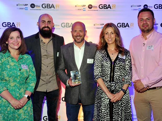 Mark Stewart and Ash Hunt of Stewart Golf celebrate the firm's win in the SoGlos Gloucestershire Business Awards 2021 International Business Award.