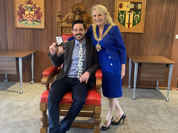Gloucester business owner is awarded Mayor’s Medal for his work for charity