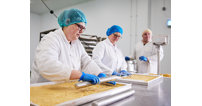 Staff hard at work at Four Anjels bakerys new Cheltenham base.