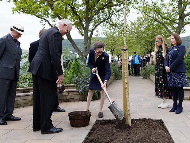 The Princess Royal plants the final tree to complete a new Platinum Jubilee garden at Three Counties Showground. Picture by Mikal Ludlow.