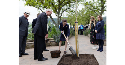 The Princess Royal plants the final tree to complete a new Platinum Jubilee garden at Three Counties Showground. Picture by Mikal Ludlow.