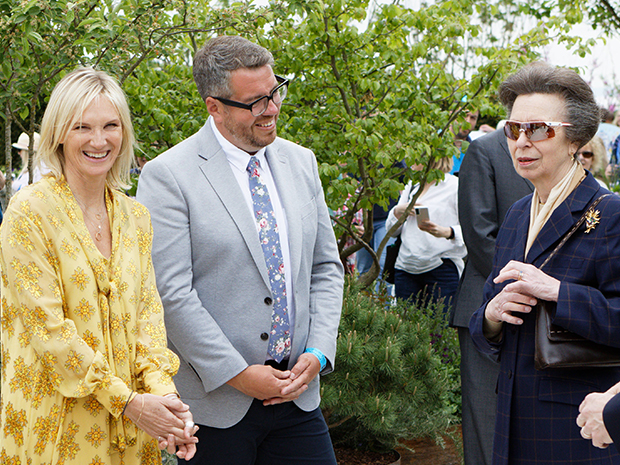 BBC Radio 2 DJ Jo Whiley and Landform Consultants landscape designer Alan Williams meet the Princess Royal at RHS Malvern Spring Festival 2022. Picture by Mikal Ludlow.