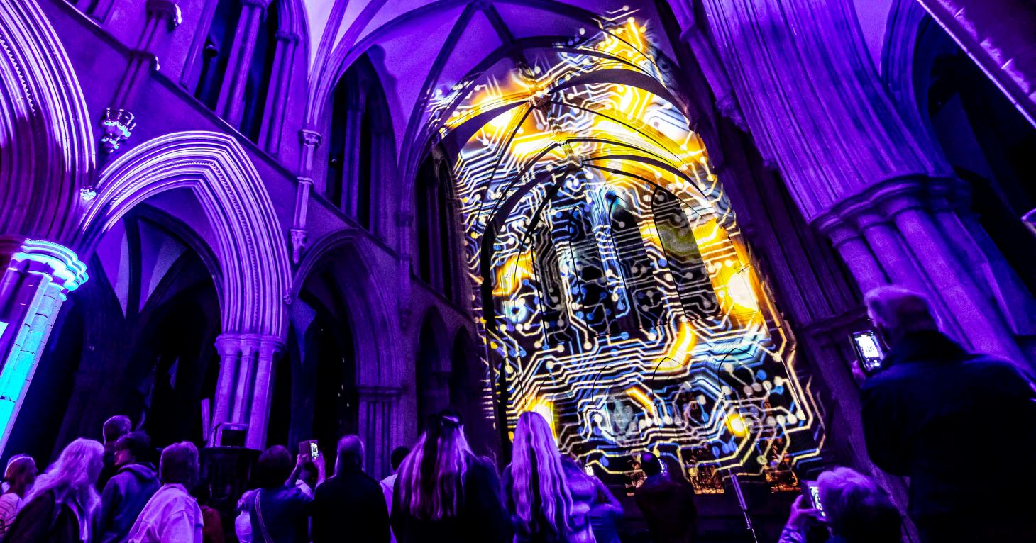 Mesmerising space-inspired light show by Luxmuralis comes to Tewkesbury Abbey