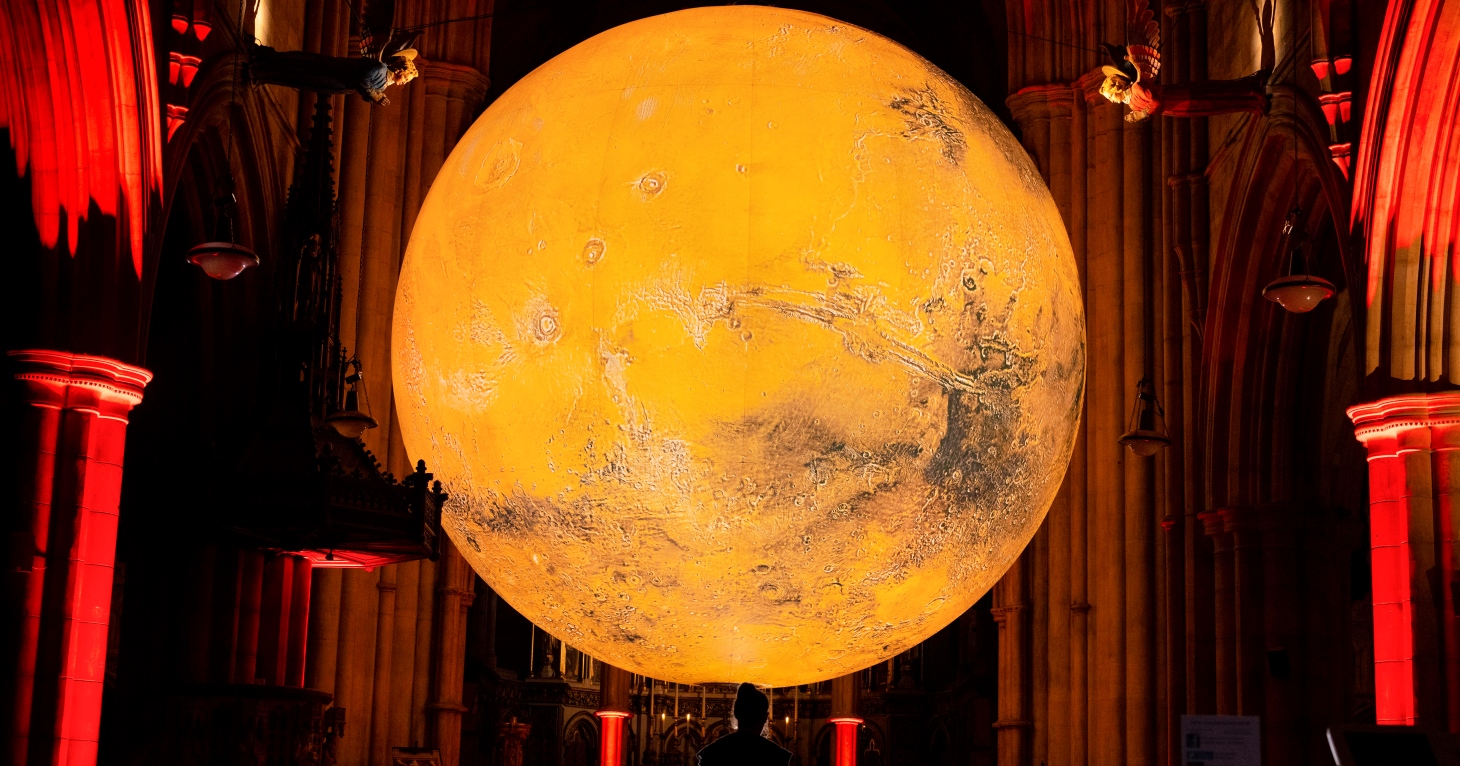 Luke Jerram's 'Mars War and Peace' sculpture at Kensington and Chelsea Festival 2023. Image  Dave Parry Press Association.